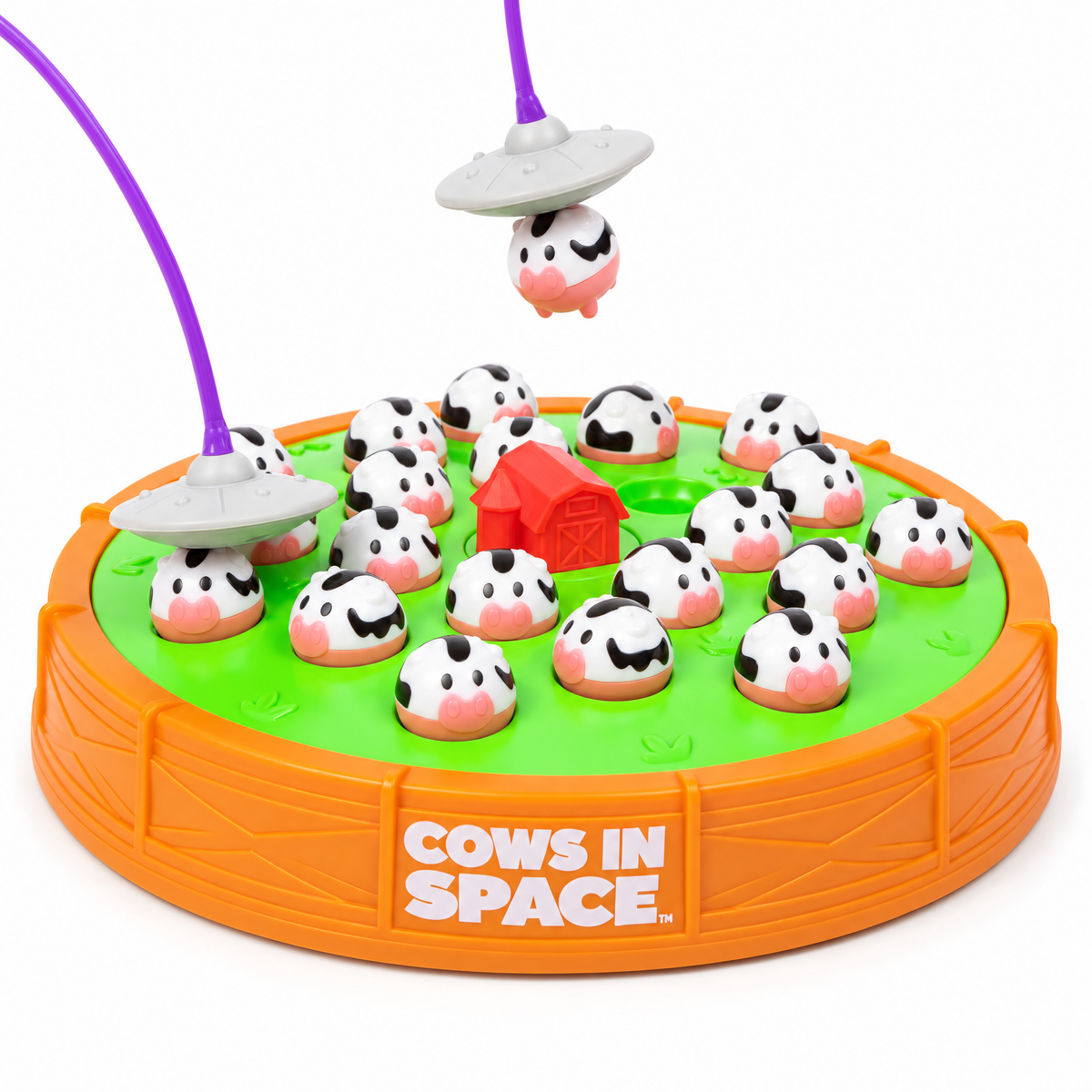 Cows In Space med orange spelbas, grönt spelfält, röd lada, kor och två lila UFO-pannband på ljus bakgrund